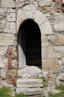 Castle door to a dark passage