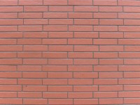 Wall of new red bricks
